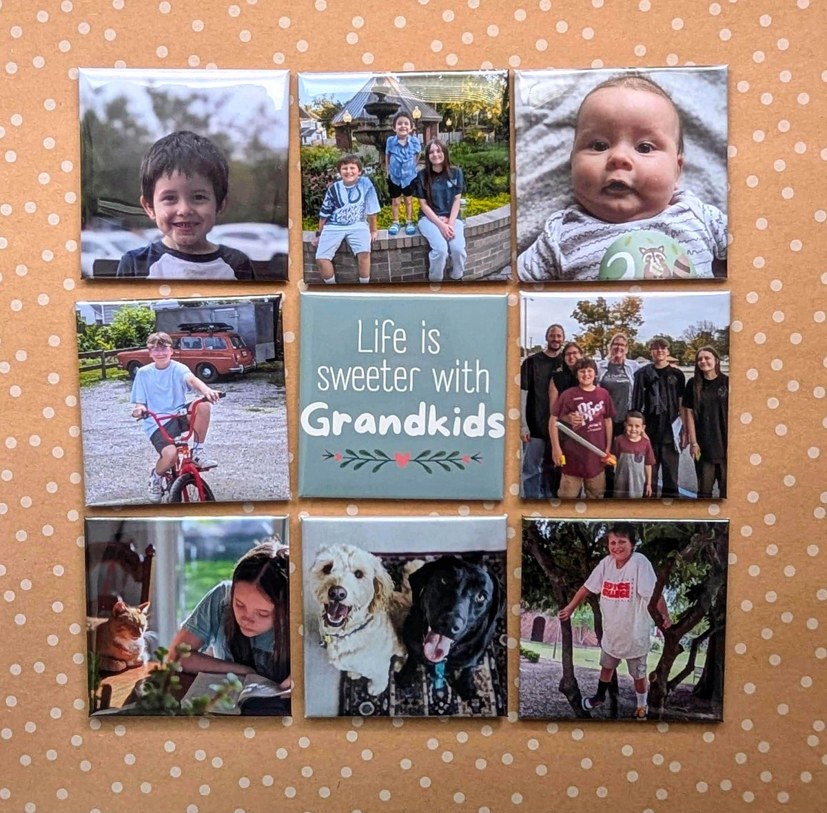 Grandkids photo magnet set on a fridge